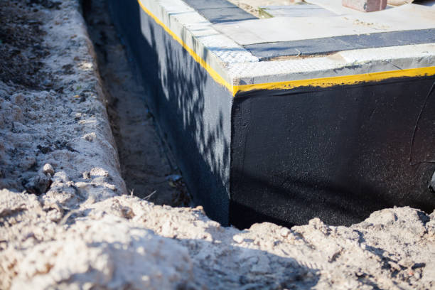 Professional Waterproofing technician working in Warrenton, VA